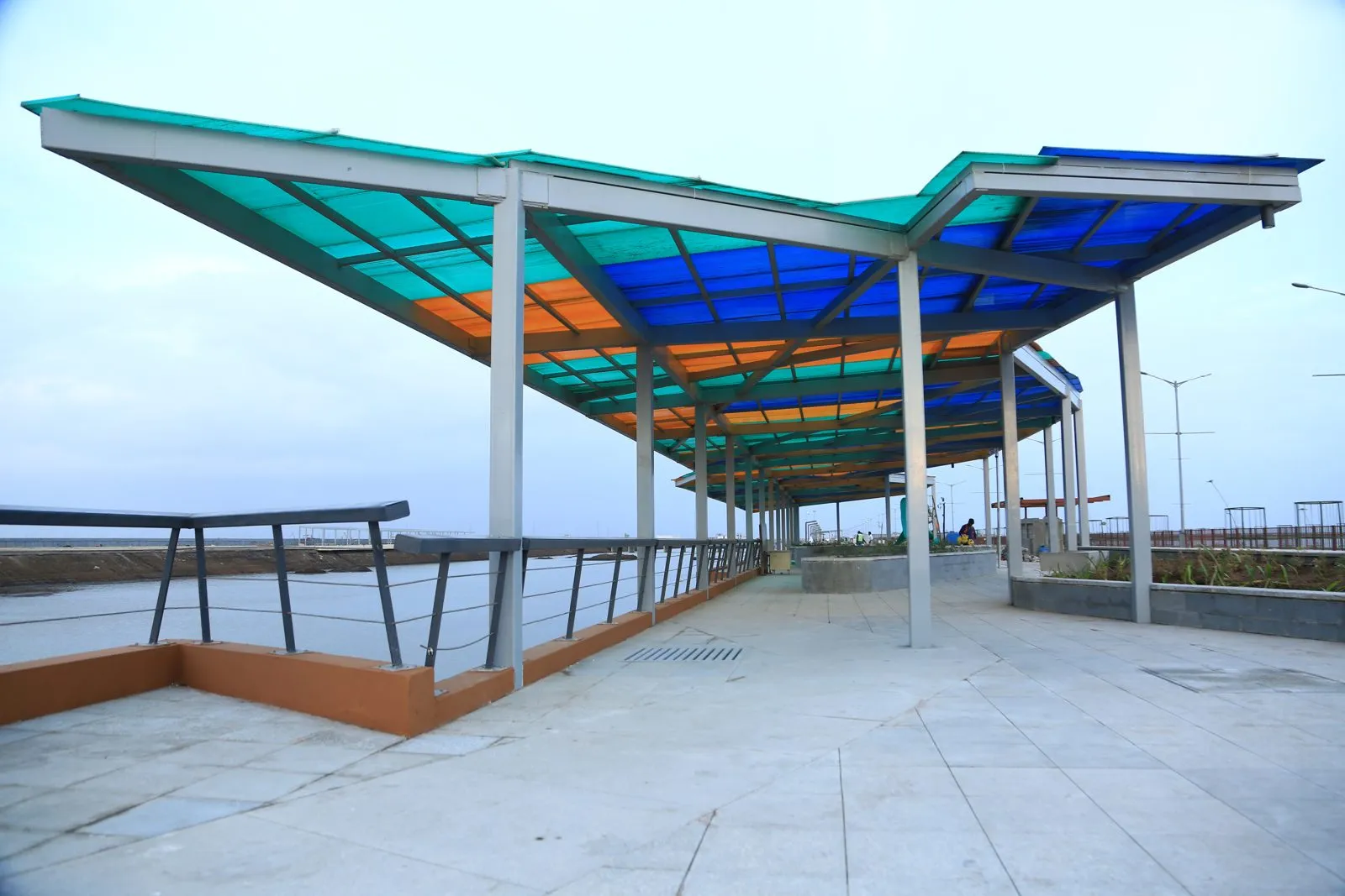 Landscaped canal front walkway in Dholera Activation Area